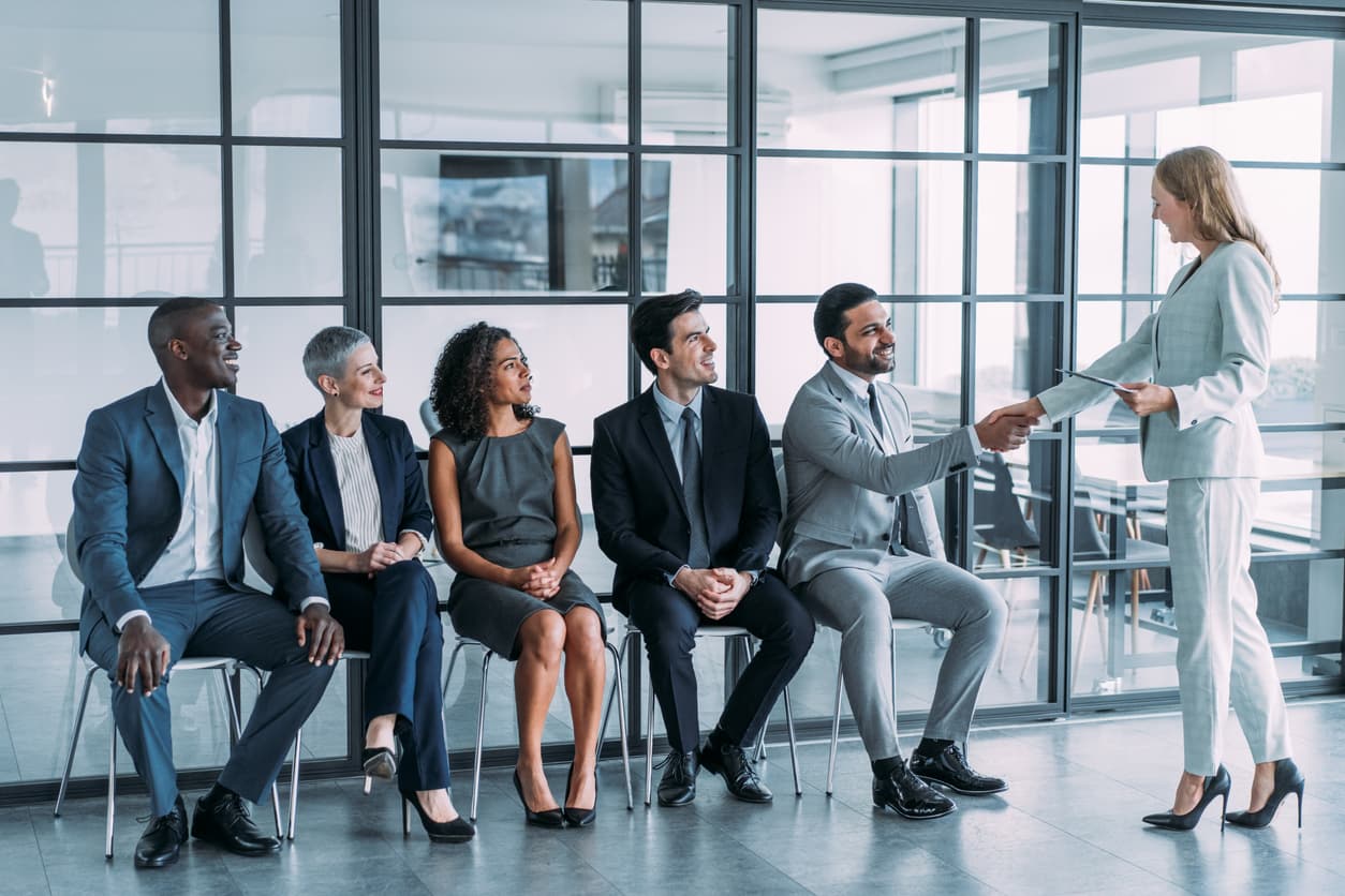 A recruitment manager gets ready to interview prospective sales team members