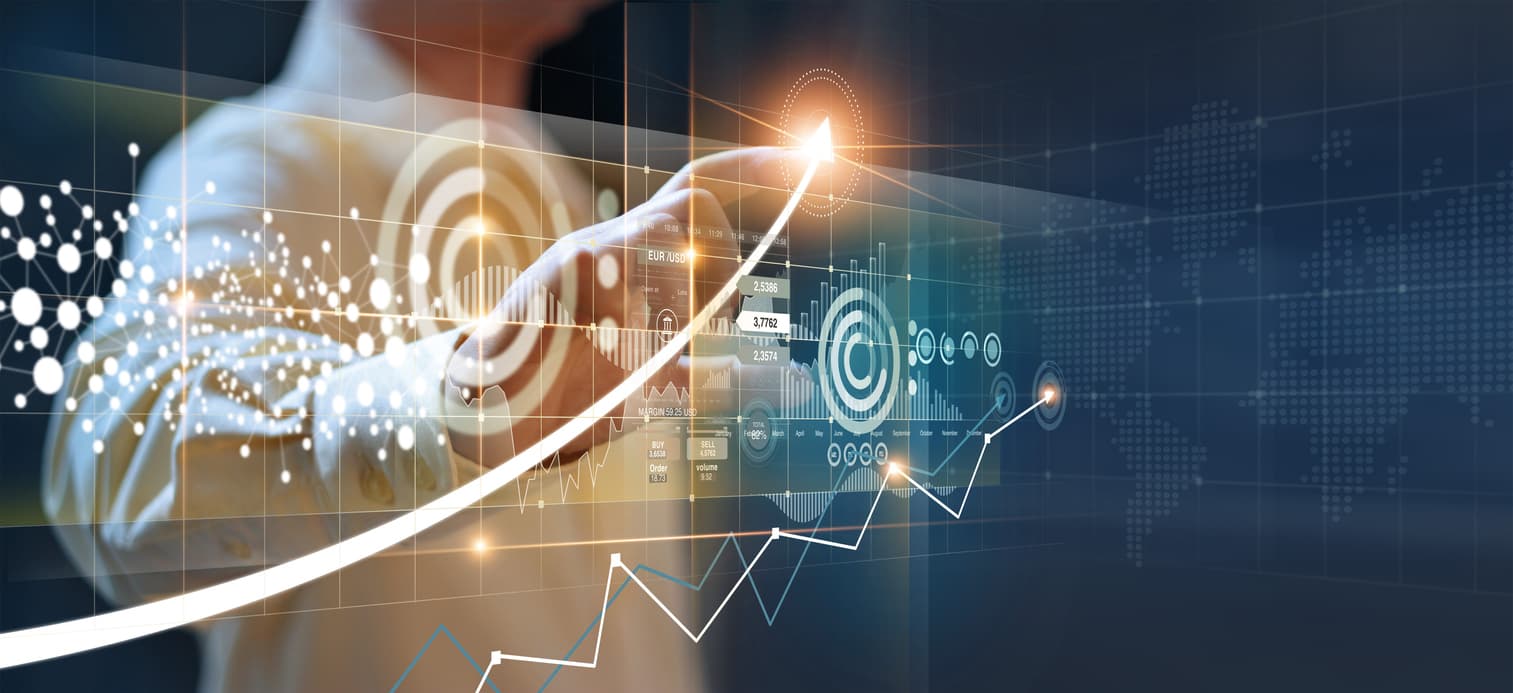 Man pointing to an arrow on a digital graph to indicate the need for sales enablement