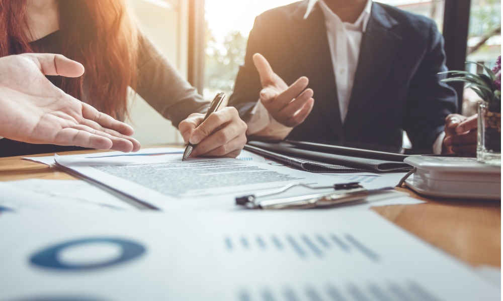 A sales leadership team drafts a sales script
